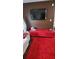 Living room featuring a red entertainment center and plush rug at 4520 Essen Lane, Cumming, GA 30041
