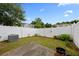 Fenced backyard with a grassy area and a concrete patio, perfect for relaxing or entertaining at 2656 Avanti Way, Decatur, GA 30035