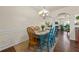 Bright dining area featuring hardwood floors and chandelier at 2656 Avanti Way, Decatur, GA 30035