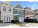 Charming townhome with a one-car garage and a well-maintained lawn at 2656 Avanti Way, Decatur, GA 30035