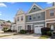 Charming townhome with a one-car garage and a well-maintained lawn at 2656 Avanti Way, Decatur, GA 30035