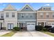 Charming townhome with a one-car garage and a well-maintained lawn at 2656 Avanti Way, Decatur, GA 30035