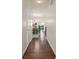 Inviting hallway with hardwood floors leading to dining and living areas at 2656 Avanti Way, Decatur, GA 30035