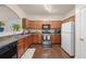 Modern kitchen with stainless steel appliances and wooden cabinets at 2656 Avanti Way, Decatur, GA 30035
