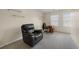 Home office setup with an electric recliner and a dedicated workspace near a window at 2656 Avanti Way, Decatur, GA 30035