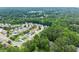 An aerial view showcases a lovely neighborhood near a lush green forest at 336 Parc Xing, Acworth, GA 30102