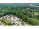 Aerial view of neighborhood with lush green trees at 336 Parc Xing, Acworth, GA 30102
