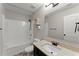 Bathroom featuring a granite vanity, tub with shower and brushed nickel fixtures at 336 Parc Xing, Acworth, GA 30102