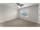 Bedroom with carpet, ceiling fan and a window providing ample natural light at 336 Parc Xing, Acworth, GA 30102
