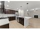 Modern kitchen boasts granite countertops, stainless steel appliances, island and open floor plan at 336 Parc Xing, Acworth, GA 30102