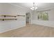 Inviting living room with updated flooring, white trim, and decorative shelves at 336 Parc Xing, Acworth, GA 30102