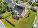 Aerial view of a home with a fenced backyard, deck with pergola, solar panels, and manicured landscaping at 966 Crest Ridge Sw Dr, Marietta, GA 30060