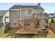 Spacious backyard featuring a deck with pergola, ideal for outdoor dining and entertaining, with solar panels at 966 Crest Ridge Sw Dr, Marietta, GA 30060