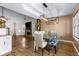 Bright dining area seamlessly connected to a cozy living space and a well-equipped kitchen at 966 Crest Ridge Sw Dr, Marietta, GA 30060