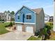 Charming home with a two-car garage, blue accents, and well-manicured landscaping at 966 Crest Ridge Sw Dr, Marietta, GA 30060