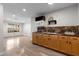 Cozy kitchen featuring wood cabinets, a gas stove, and modern appliances at 966 Crest Ridge Sw Dr, Marietta, GA 30060