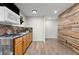 Efficient kitchen space with wood accents, wooden floors, and basic appliances at 966 Crest Ridge Sw Dr, Marietta, GA 30060