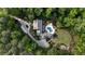 Expansive estate featuring mature trees, a private pool, a playground, and a long driveway at 11355 Bowen Rd, Roswell, GA 30075