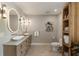 Elegant bathroom features double sinks, natural wood accents, and a modern design at 11355 Bowen Rd, Roswell, GA 30075