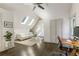 Bonus room with hardwood floors, three skylights, and a vaulted ceiling at 11355 Bowen Rd, Roswell, GA 30075