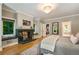 This main bedroom has a fireplace, built in benches and large windows at 11355 Bowen Rd, Roswell, GA 30075
