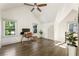 Bright office features hardwood floors, three windows for natural light, and a vaulted ceiling at 11355 Bowen Rd, Roswell, GA 30075