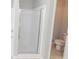 Bright bathroom featuring tile flooring, shower with glass doors, and neutral color palette at 1731 Pryor Sw Rd # 109, Atlanta, GA 30315