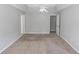 Spacious bedroom with neutral color palette, carpet flooring and adjoining bathroom at 1731 Pryor Sw Rd # 109, Atlanta, GA 30315
