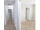 Hallway with carpeted floor leading to bedroom and doorway view of a bathroom at 1731 Pryor Sw Rd # 109, Atlanta, GA 30315
