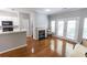 Bright living room with hardwood floors, fireplace and french doors at 1731 Pryor Sw Rd # 109, Atlanta, GA 30315