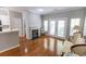 Bright living room with hardwood floors, fireplace and french doors at 1731 Pryor Sw Rd # 109, Atlanta, GA 30315
