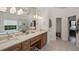Bathroom featuring double vanity, soaking tub, and separate shower; a spa-like retreat within your home at 4735 Cambridge Trce, Atlanta, GA 30338