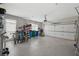 Oversized garage with ample storage space and an epoxy floor offers parking and organization at 4735 Cambridge Trce, Atlanta, GA 30338