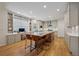Modern kitchen featuring stainless steel appliances, custom cabinets, large island, and built-in desk at 4735 Cambridge Trce, Atlanta, GA 30338