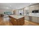 Beautiful kitchen with a large island, stainless steel appliances, and a seamless flow to the living room at 4735 Cambridge Trce, Atlanta, GA 30338