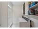Functional laundry room features modern washer and dryer, storage cabinets and a bright window at 4735 Cambridge Trce, Atlanta, GA 30338