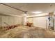 Unfinished basement featuring a water heater, projector, and ample open space at 4831 Oak Path, Stone Mountain, GA 30088