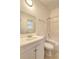 Bathroom featuring a vanity, mirror, toilet, and shower/tub combo with white tile at 4831 Oak Path, Stone Mountain, GA 30088