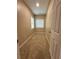 Cozy bedroom with carpeted floors, a window, and neutral paint at 4831 Oak Path, Stone Mountain, GA 30088
