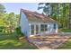 Charming home featuring a patio and beautiful views of the surrounding trees at 4831 Oak Path, Stone Mountain, GA 30088