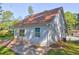 This angle showcases the back of this home which has a patio at 4831 Oak Path, Stone Mountain, GA 30088