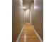 Hallway with hardwood floors connects the rooms of this well-maintained home at 4831 Oak Path, Stone Mountain, GA 30088