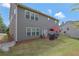 A lovely backyard featuring a patio set under a red umbrella, perfect for outdoor relaxation at 760 King Sword Ct, Mableton, GA 30126