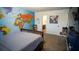 Bedroom featuring a world map mural, a bed, and access to a bathroom at 760 King Sword Ct, Mableton, GA 30126