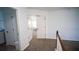 Spacious hallway offering access to a bedroom and laundry room for convenience at 760 King Sword Ct, Mableton, GA 30126