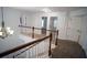 Upstairs landing with chandelier and a view of the staircase at 760 King Sword Ct, Mableton, GA 30126