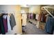 Spacious walk-in closet with ample shelving and hanging space for organized clothing storage at 760 King Sword Ct, Mableton, GA 30126