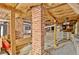 Unfinished basement showing brick pillars and exposed ceiling, with ample space for customization and storage at 78 Atlanta Se Ave, Atlanta, GA 30315