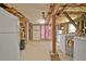 Unfinished basement with exposed ceiling and brick supports, offering potential for customization and storage at 78 Atlanta Se Ave, Atlanta, GA 30315