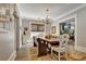 Elegant dining room with chandelier, wood table, and comfortable seating arrangement that makes it inviting and perfect for gatherings at 78 Atlanta Se Ave, Atlanta, GA 30315